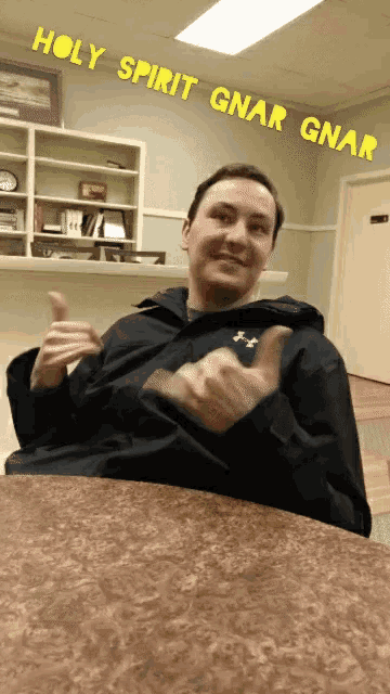 a man giving a thumbs up with the words holy spirit gnar gnar behind him