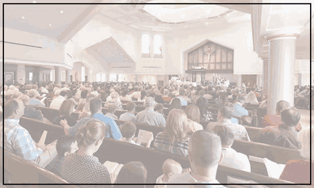 a poster for life church in norman ok shows a large crowd