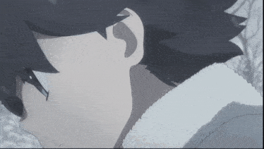 a close up of a person 's ear with a white furry collar