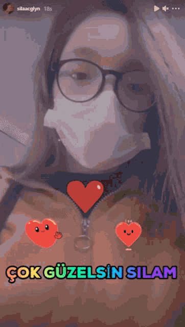 a girl wearing glasses and a mask says çok güzelsin silam on the bottom