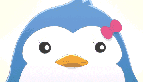 a blue and white penguin with a pink bow on it 's head