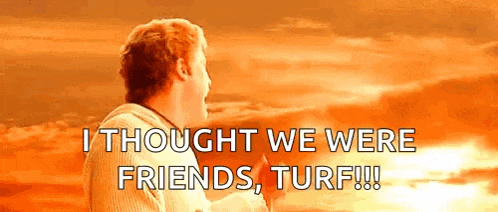 a man is standing in front of a sunset and saying i thought we were friends turf !!!
