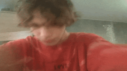 a person wearing a red shirt that says i 'm on it