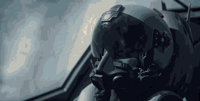 a close up of a person wearing a helmet