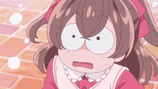 a girl with a surprised look on her face is wearing a pink dress