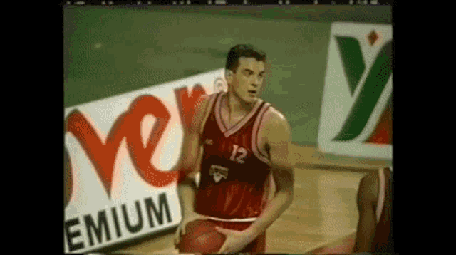 a basketball player with the number 12 on his shirt