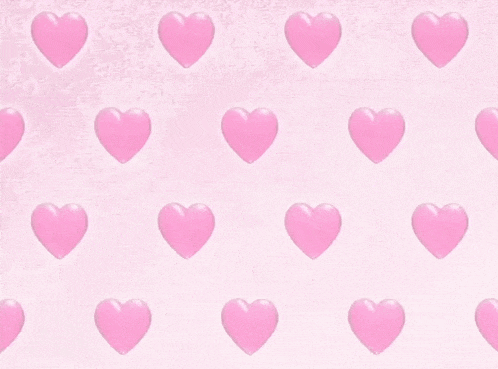 a pattern of pink hearts on a pale pink background