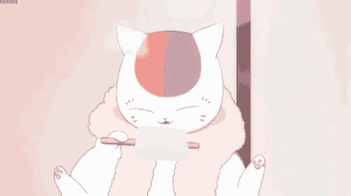 a cat is eating ice cream with chopsticks .