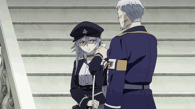 a man and a woman are standing next to each other and the man has the letter j on his chest