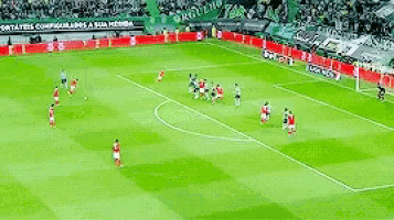 a group of soccer players are playing a game on a soccer field