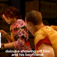 a man and a woman are kissing with the words daisuke showing off him and his boyfriend below them