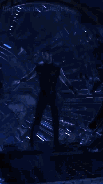 a man in a superhero costume is holding a hammer and a raccoon on his back .