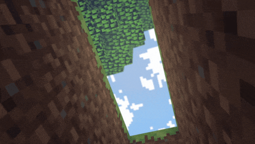 a window in a brick wall shows a blue sky with clouds