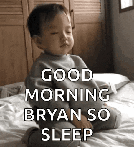 a baby sitting on a bed with the words good morning bryan so sleep