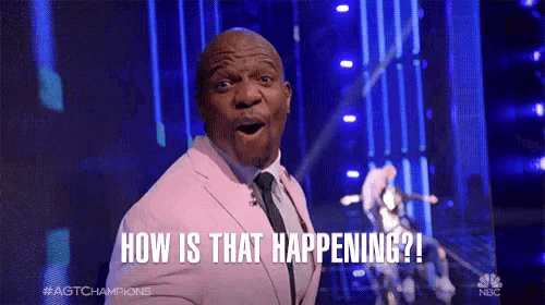 a man in a pink suit and tie is saying how is that happening
