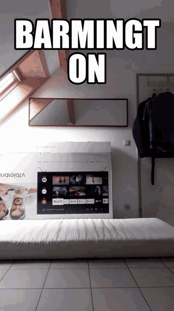 the word barmingt is on the wall above a tv