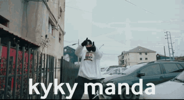 a man giving a thumbs up with the words kyky manda on the bottom