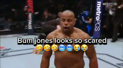 a man in a boxing ring with the words " bum jones looks so scared "