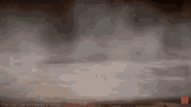 a smokey background with youtube.com in the upper right corner