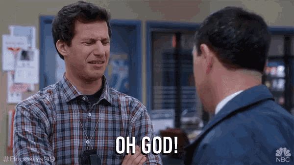 a man in a plaid shirt is talking to another man and says oh god