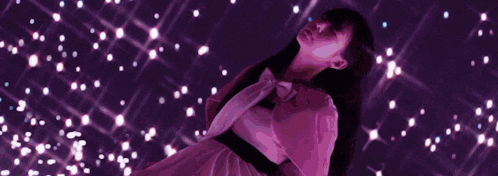 a purple and blue background with a silhouette of a person in the middle