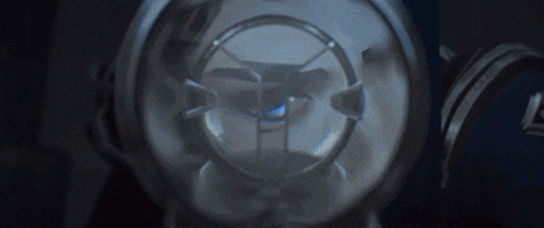 a close up of a clock with a blue light inside