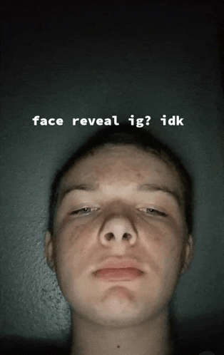 a close up of a person 's face with the words face reveal ig idk written above it