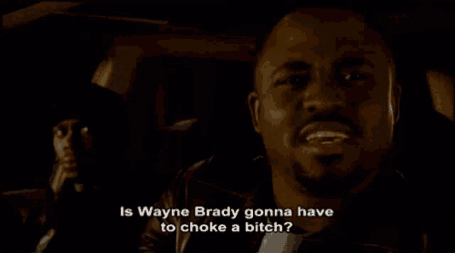a man in a car with the words is wayne brady gonna have to choke a bitch below him
