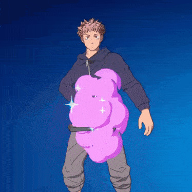 a man in a hoodie is holding a pink object in his hand
