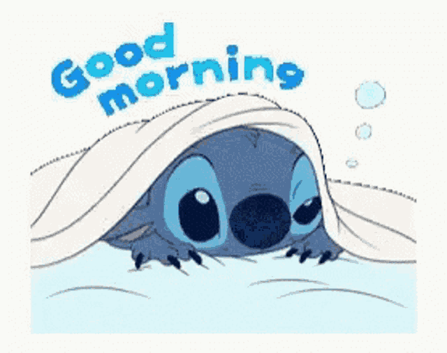 a sticker of stitch laying under a blanket with the words `` good morning '' .