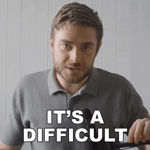 a man says it 's a difficult while holding something in his hand