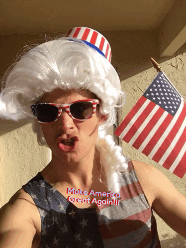 a man wearing a patriotic wig and sunglasses says make america great again !!!