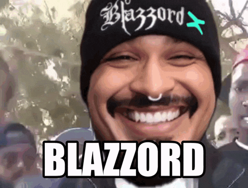 a man wearing a hat that says blazzard on it