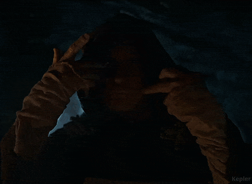 a close up of a man in a dark room with the word kepler on the bottom