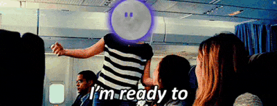 a woman in a striped shirt says i 'm ready to on a plane
