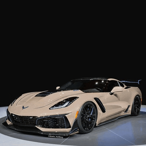 a sports car with a black background and a sticker that says thatz_betboy