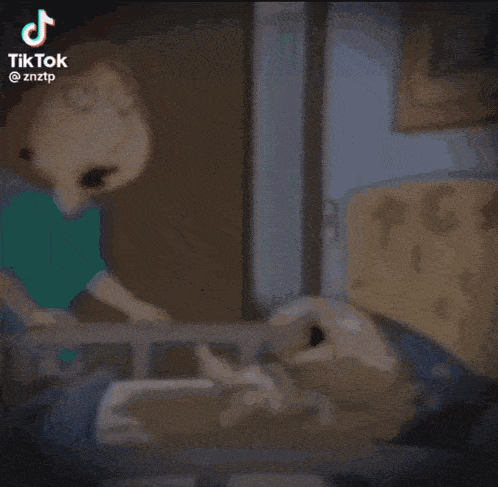 a cartoon character is standing next to a cartoon character in a bed .
