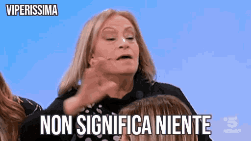 a woman is making a funny face with the words non significa niente written below her