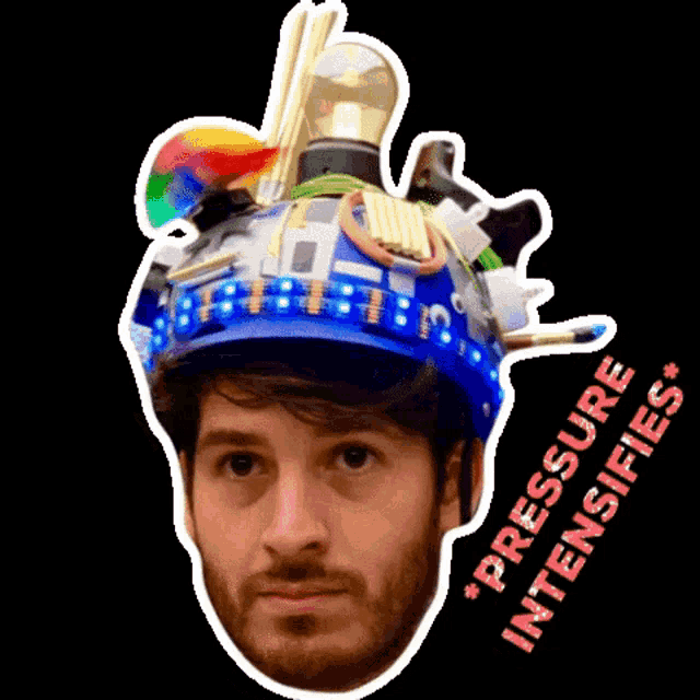 a man wearing a helmet with a sticker that says " pressure intensifies "