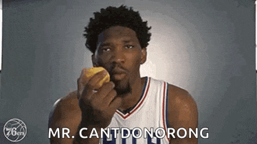 a basketball player is holding a donut in his hand and says `` mr. cantdonorong '' .