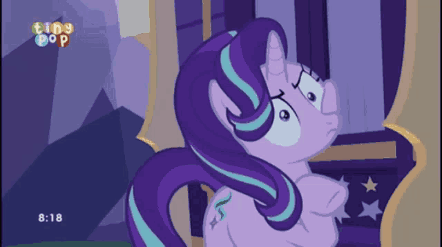 a cartoon of a purple pony with the time of 8:18