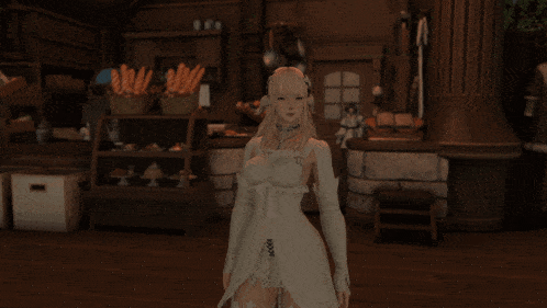 a woman in a white dress standing in a room