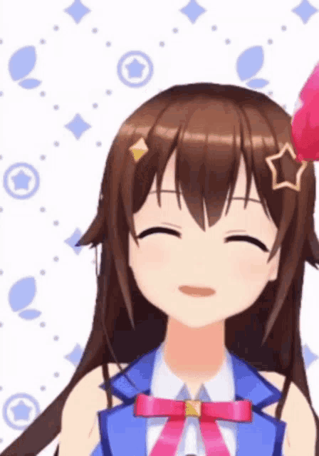 a close up of a girl with a star on her hair