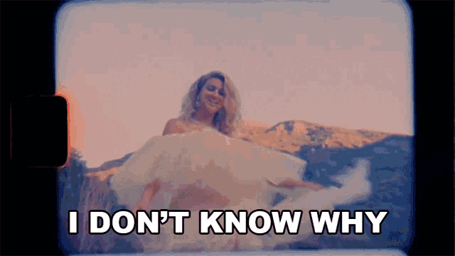 a woman in a white dress with the words i don 't know why above her