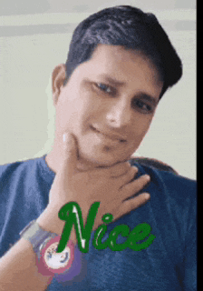 a man in a blue shirt with the word nice written on his shirt
