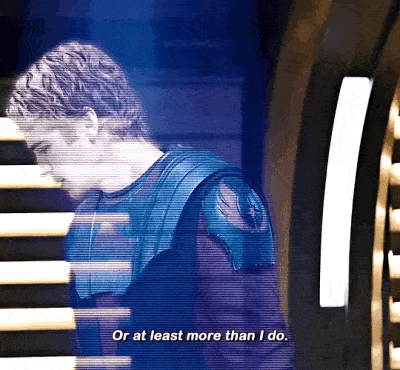 a man is standing in front of a staircase and saying or at least more than i do .