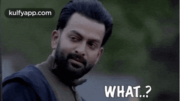 a man with a beard is making a funny face and saying what ?