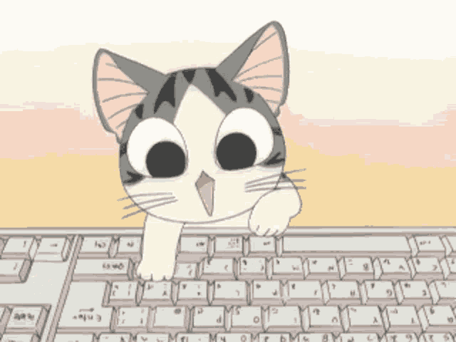a cartoon cat is peeking over a keyboard