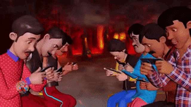 a group of people are sitting next to each other looking at their phones .
