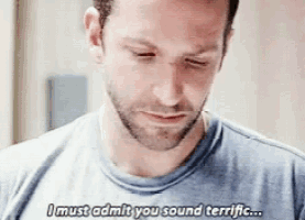a man with a beard is saying i must admit you sound terrific